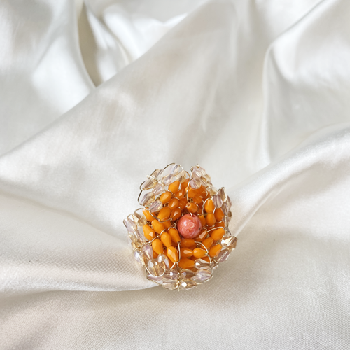 aro de flor naranja de cristal